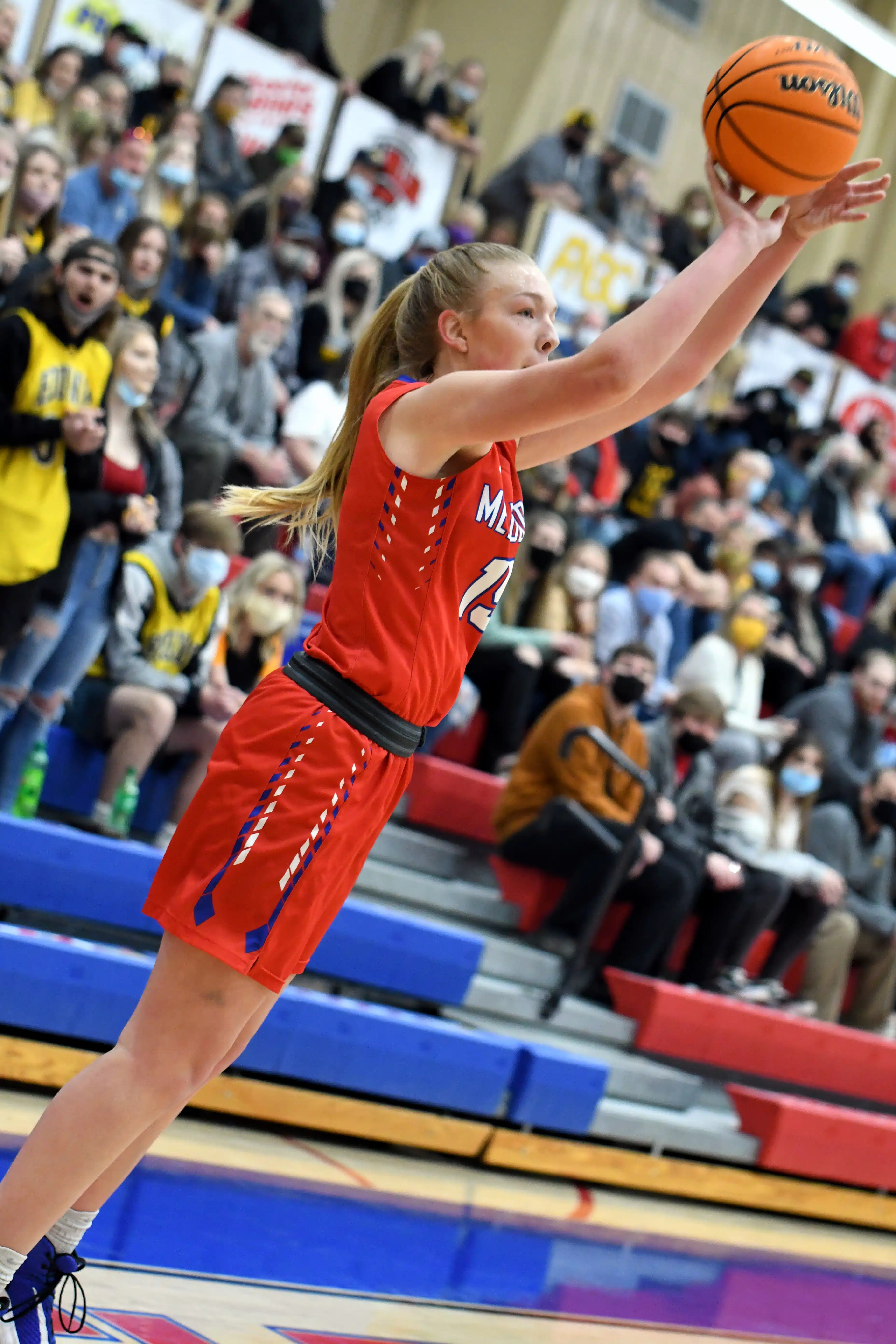 Kylee Humphries shooting a 3-pointer for the Melbourne Lady Bearkatz during the 2021 2A Central Regional Basketball Tournament in Melbourne, Arkansas