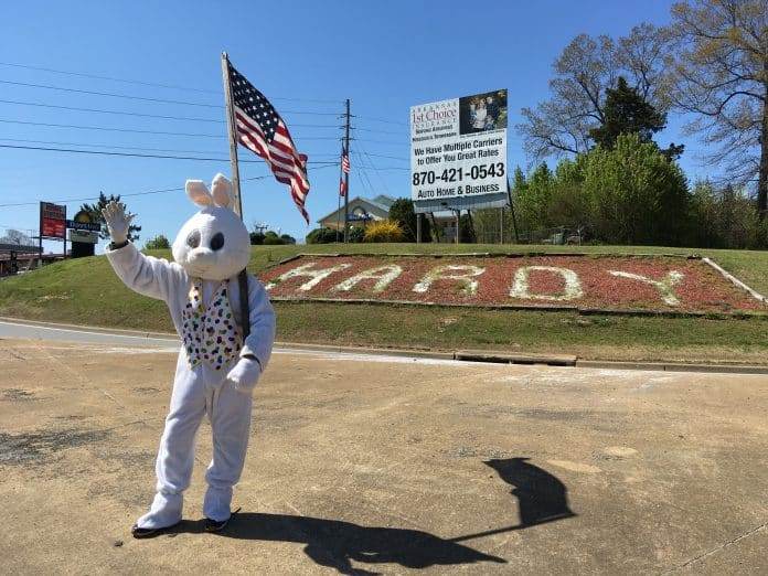 Tim Seager (Two Tie Timmy) as the Easter Bunny waving and greeting travelers in Hardy Arkansas